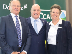 Prime Minister Christopher Luxon flanked by DCANZ chair Guy Roper (left) and DairyNZ chair Tracy Brown at Parliament.