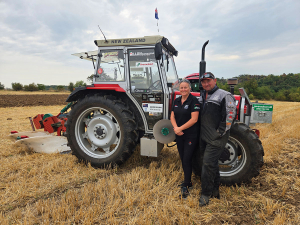 Sonia and Mark Dillon and the trusty tractor.