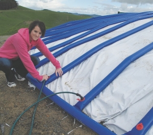 Better way to keep silage stack covers down