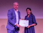 AsureQuality Limited Group Service Manager Mike Fenton with AsureQuality Seed Technology Scholarship recipient Dhanesha Nanayakkara. Photo Credit: Massey University.