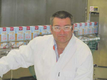 Westland Milk UHT manufacturing manager David Reid. Below left: Westgold UHT milk bound for China.