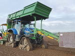The bulb planter machine is operated by a two-person team, with the driver keeping an eye on various camera feeds to oversee machine guidance, speed and the loading system.