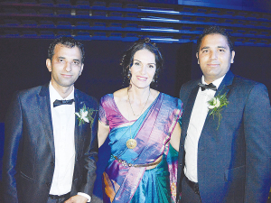New Zealand Dairy Awards Trust chair Natasha Tere flanked by Share Farmers of the Year Manoj Kumar (left) and Sumit Kamboj at the awards night.
