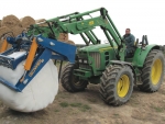 Manually removing smelly bale wraps a thing of the past