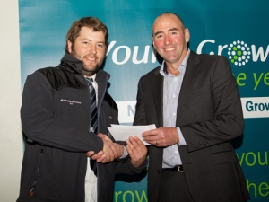 Tom Dalziel (left) receiving his award from competition&#039;s coordinator, and local orchardist, Andrew Kininmonth.