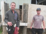 Greig Furniss (left) and herd manager Tom Orlowski with their new loading facility.