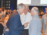 Former Fonterra directors Greg Gent (left), Harry Bayliss (centre), and Earl Rattray discuss matters at the annual meeting.