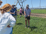 Cameron Henderson explains features of the drip-tube irrigation system he is trialling, to attendees at a field day on his North Canterbury farm.