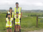 Helensville farmers Scott and Sue Narbey with Bella and Ollie.