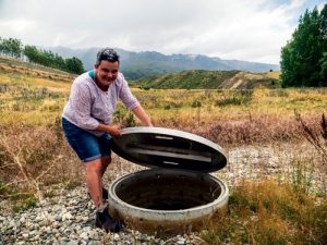 Amisfield winemaker Stephanie Lambert lifting the lid on one of the waste water cells.