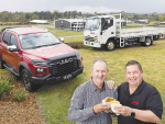 Richard Lindroos, CEO of New Zealand National Fieldays Society and JAC NZ general manager Andrew Craw, sealing the deal with a good old-fashioned steak pie.
