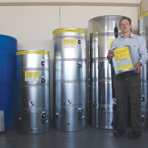 Trevor Edwards with range of hot water cylinders.