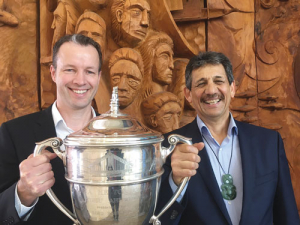 Dairy NZ’s Tim Mackle and Kingi Smiler hold the Bledisloe Cup, which will be awarded to the top Maori dairy farmer this time.