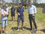 Roger Hutchings (middle) and Minister for Primary Industries Nathan on his farm earlier this month.
