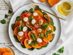 Persimmons can be enjoyed fresh, sliced into salads, or used in baking and desserts.