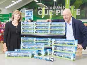 Matt Shirtcliffe, creative director Shirtcliffe &amp; Co (right) and Michelle Thompson, chief executive RHANZ, with the mini tankers at the Fonterra Farm Source Store in Cambridge.