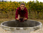 Dom Maxwell with the concrete fermenter Greystone has been using for the past three years. Photo by Richard Brimer.