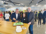 Fonterra chief executive Miles Hurrell (left) cuts the 10th birthday cake with Farm Source head Anne Douglas (middle) and managing director co-op affairs Mike Cronin.