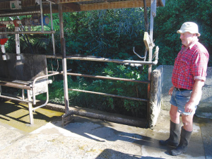 ￼Kaikoura dairy farmer Graham Collins at the dairy shed originally built by his father in 1971 and damaged in the November 14 earthquake.