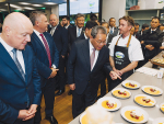 Chinese Premier Li Qiang and Prime Minister Christopher Luxon look at Fonterra’s food service and ingredients products at display at the co-op’s Auckland headoffice.
