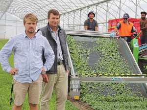 Leaderbrand manager glasshouse operation, Billy Stackhouse (left) and chief executive Richard Burke with the electric harvester.