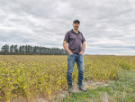 FAR senior field officer Ben Harvey on the FAR research station at Chertsey in Mid-Canterbury. The paddock is a cover crop of buckwheat. Photo Credit: Nigel Malthus