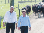 Fonterra’s former chief executive Theo Spierings (left) and former chairman the late John Wilson on a dairy farm in a photograph taken in 2011.