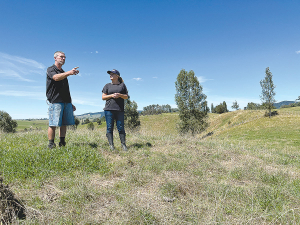 NIWA researcher Fleur Matheson with farmer Grant Wills on his family’s property in the Waikato region.