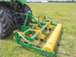 Depth is controlled by a full-width flat roller.