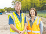 Gary and Penny Robinson of Robinson Subsurface Drip Irrigation at Linwood Park in Christchurch where their underground irrigation system is being installed.