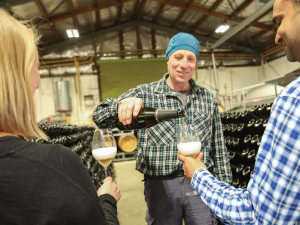 Rudi Bauer pouring tastings at Quartz Reef in Central Otago