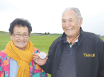 George Hopa and his wife Pani with the medal they won for the best dairy farm back in 1967.