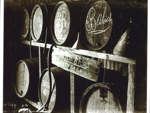 Wine barrels in the original tin shed winery at Kaikino, Northland.