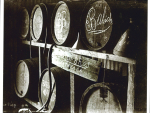 Wine barrels in the original tin shed winery at Kaikino, Northland.