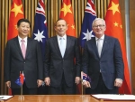 Australian Prime Minister Tony Abbott (centre) and Trade Minister Andrew Robb with Chinese President Xi Jinping.