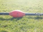 Effluent hoses are made easier to drag around by Hose Buoy.