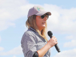 Chief executive of Pouarua Farms, Jenna Smith addresses the field day crowd.