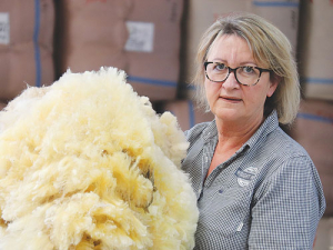 Philippa Wright with some this year’s long, yellow wool.