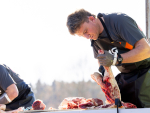 George Dodson completing a boning challenge as part of a 30-minute head to head challenge. Photo Supplied.