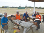 Northland field days committee members (from left) Ross Newlove, Gail Cole, Basil Cole, Shane Hanley, Ned Stevens and John Phillips take a well-earned break from marking out the Dargaville showgrounds site  late last month.