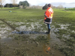 A Waikato Regional Council officer inspecting the extent of over application of effluent at the Trinity Lands farm