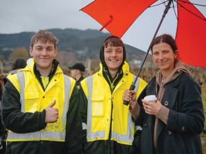 Sam Wickham, right, helps with judging at the competitions. Photo Credit: Richard Briggs
