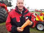 The Harvest Centre’s Roger Nehoff with the plus-sized carrot harvester at the recent SIAFD at Kirwee.