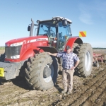 Giant red fleet does the hauling on potato farm