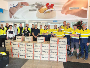 The Darfield Maintenance &amp; Hapori Programme teams with the Christmas food boxes packed and ready to be delivered.