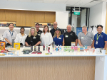 Fonterra farmer shareholders with staff at the Te Matapuna Innovation lab in Singapore.