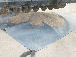 Laid out on the floor with the discharge sock tied off, a drill can be driven over the sheet, the hopper emptied and the machine moved out of the way.