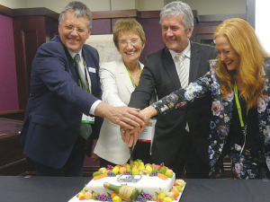 Hort leaders (from left) Horticulture NZ chairman Julian Raine, Primary ITO chief executive Linda Sissons, Agriculture Minister Damien O’Connor and NZ Avocado chief Jen Scoular representing the Horticulture Capability Group, cut the cake at the official launch of a new horticulture apprenticeship scheme. 