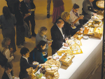 Attendees at the IDF Dairy Summit sample French cheeses in Paris last month.