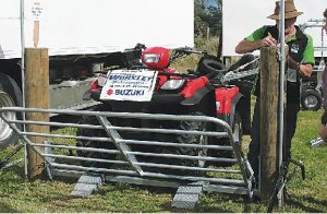 Fold-down gate falls to quad